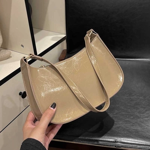 Khaki pleated faux leather baguette bag with a crescent shape for women's daily fashion