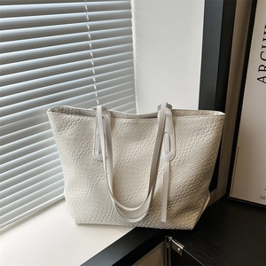Minimalist white woven tote bag with large capacity and elegant faux leather texture