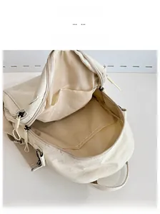 Internal display of the large capacity beige nylon backpack with zipper and pocket