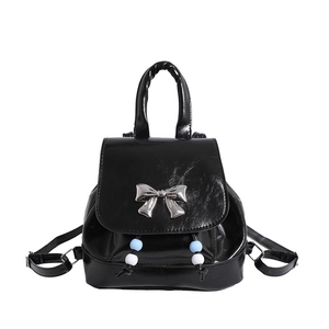 Glossy black mini backpack with silver metal butterfly and beaded drawstring details