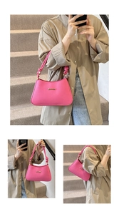 Detail of pink faux leather handbag with V-shaped wave pattern and woven knot shoulder strap