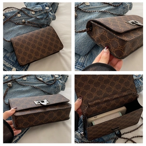 Detailed views of vintage brown clover pattern crossbody bag with metal chain strap