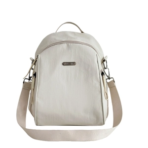 Minimalist large capacity beige nylon travel backpack for women with metal plaque
