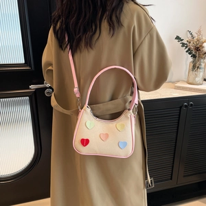 Sweet half-moon canvas bag with pink trim and colorful heart embroidery for women