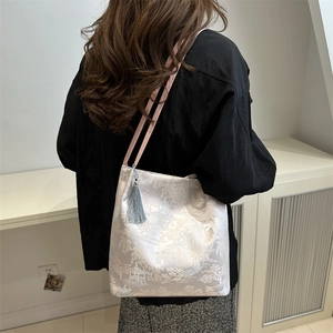 New Chinese style embroidered jacquard shoulder bag with landscape patterns and tassel detail