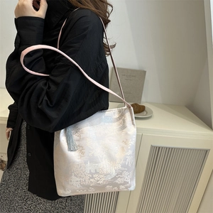 Elegant Chinese style jacquard tote bag with landscape pattern and pink leather strap