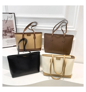 Detail view of large tote bags in black, brown, and beige with smooth PU leather texture