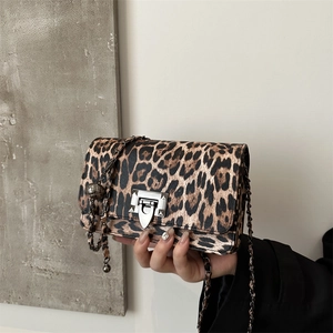 Retro leopard print crossbody flap bag with silver chain strap and metal lock closure