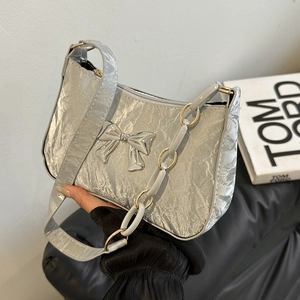 Silver pleated underarm bag for women with metallic bow detail and decorative chain strap