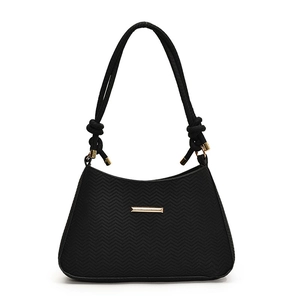 Chic black underarm bag with V-shaped embossing and golden metal accents