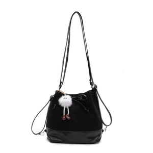 Chic black bucket bag with dual-texture splicing and a cute white plush pendant