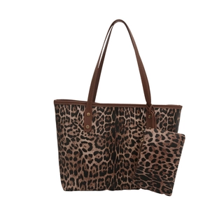 Vintage leopard print tote bag set with brown leather handles for stylish daily commute