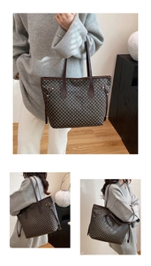 Dettaglio della borsa tote vintage con coulisse laterali e motivo a scacchi marrone