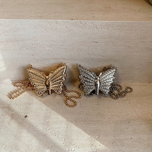 Elegant butterfly pendant necklaces with glittering rhinestones in gold and silver finish