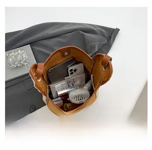 Interior view of the plush tote bag showing large capacity for essentials and cosmetics