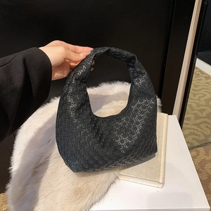 Minimalist black woven leather hobo bag for women with textured crescent shape