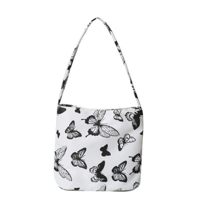 Grand sac cabas minimaliste blanc avec imprimé papillon noir pour femme moderne