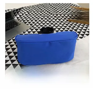 Detail shot of the wear-resistant nylon bottom of this royal blue crossbody bag