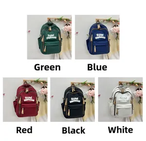 Detailed view of large capacity backpacks in green, blue, red, black, and white colors