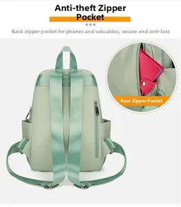 Waterproof light green nylon backpack with anti-theft back pocket and adjustable straps