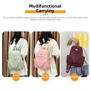 Nylon water-resistant backpack shown in mint green, pink, and burgundy styles