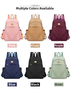 Waterproof nylon backpack shown in six colors including pink, purple, and green options