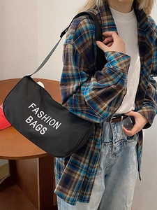 Minimalist black canvas crossbody bag with white fashion text print for outdoor daily use