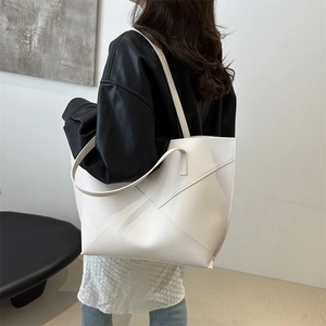 Minimalist white geometric patchwork tote bag with high-capacity shoulder strap design