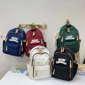 Minimalist large capacity school backpack for students in five vibrant colors