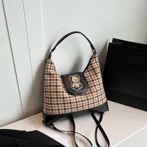 Vintage brown plaid canvas tote bag with black leather trim and cute bear patch