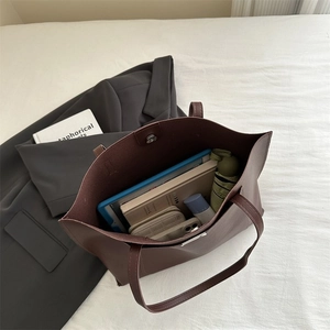 Spacious tote bag interior showing ample storage for books and everyday essentials