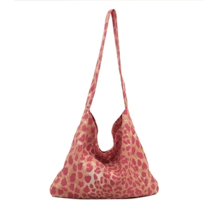 Pink leopard print canvas tote bag with large capacity and minimalist shoulder strap design