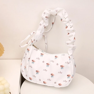 Floral canvas crescent shoulder bag with pleated handle and Beautiful print text