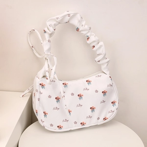 Minimalist white floral canvas crescent bag with ruched handle and beautiful print