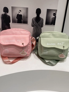 Cute Korean style crossbody bags in pink and green with cartoon sausage dog print