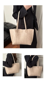 Detail view of large apricot tote bag with marble texture and golden Fashion text