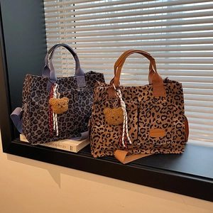 Stylish leopard print canvas tote bag with large pockets and cute bear charm in two colors