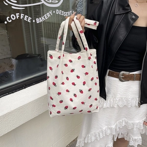 Borsa tote in velluto a coste bianca con stampa fragole rosse per shopping casual e moda