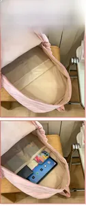Internal layout of pink backpack with compartments for tablet and accessories
