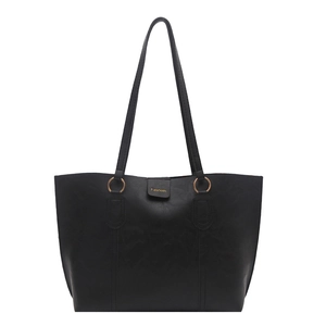 Minimalist black large capacity tote bag with long straps and gold hardware for women