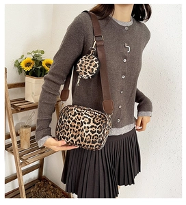 Leopard print crossbody travel bag set with adjustable strap and small round coin purse