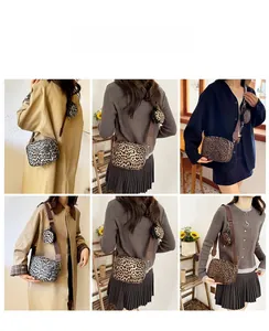 Detail of leopard print crossbody bag with adjustable wide strap and round coin purse