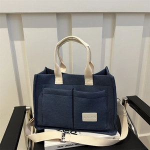 Sac cabas minimaliste en toile bleu marine avec deux poignées et large bandoulière