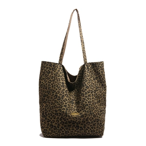 Stylish leopard print canvas tote bag with large capacity and handmade logo detail
