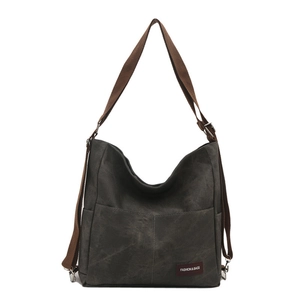 Versatile dark grey canvas backpack and crossbody bag for travel with stylish design