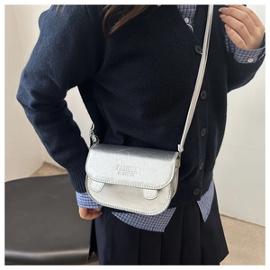 Silver crackle textured crossbody bag with metal finish and fashion imprint detail
