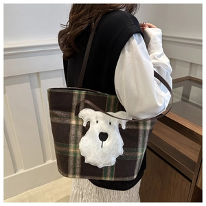 Detail of wool plaid tote bag with cute white schnauzer embroidery and slim straps
