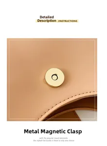 Detail shot of the golden magnetic clasp and smooth leather stitching on the shoulder bag