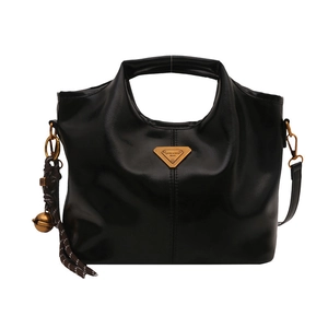 Retro black leather bucket bag with top handle and adjustable shoulder strap for women