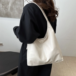 Minimalist creamy white leather tote bag in large capacity for winter commuting fashion